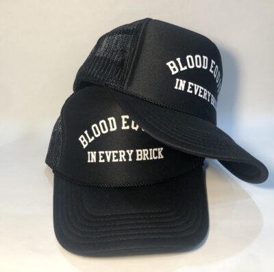 A black hat with the words blood counts in every shift on it.