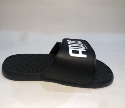 A pair of black flip flops with the word " fixer ".