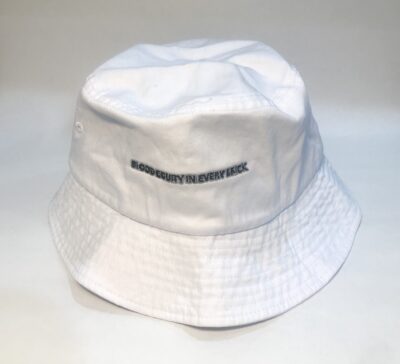 A white bucket hat with the words " construction ".